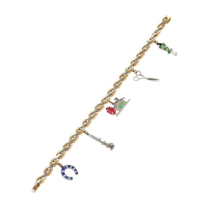 Cartier - CARTIER 18K YELLOW GOLD 7 CHARMS BRACELET